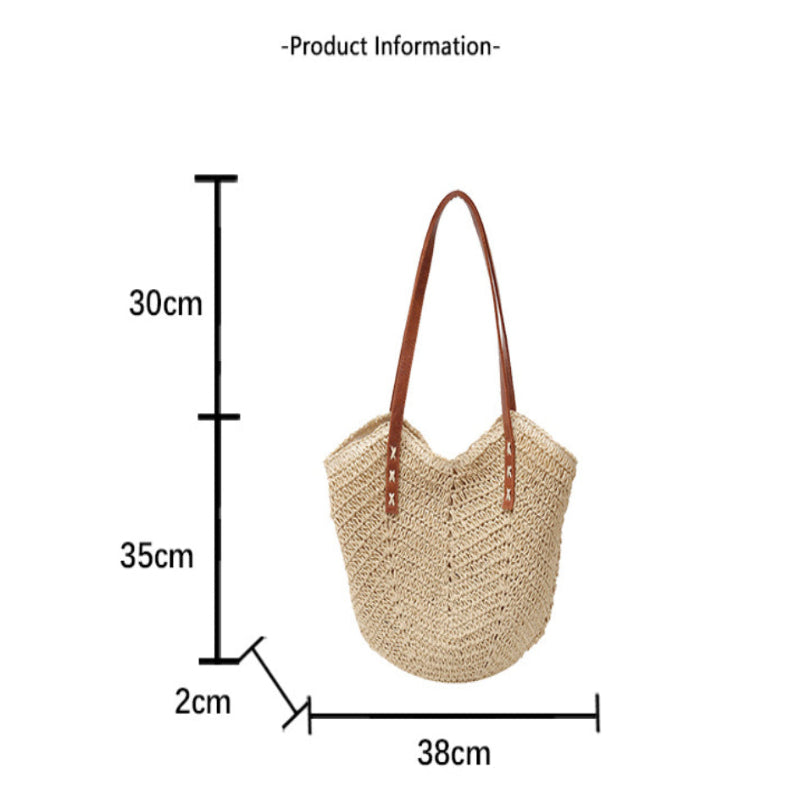 Beige straw tote bag with brown handles and dimensions on a white background