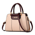 Beige handbag with brown accents and gold hardware on a white background