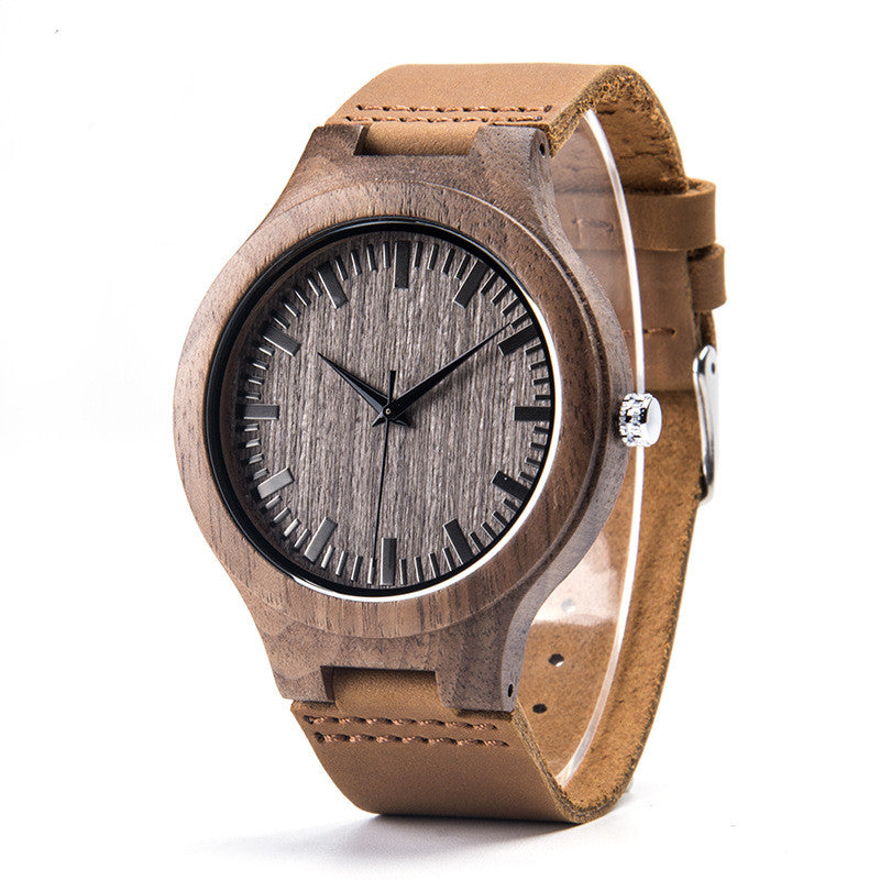 Wooden watch with brown leather strap on a white background