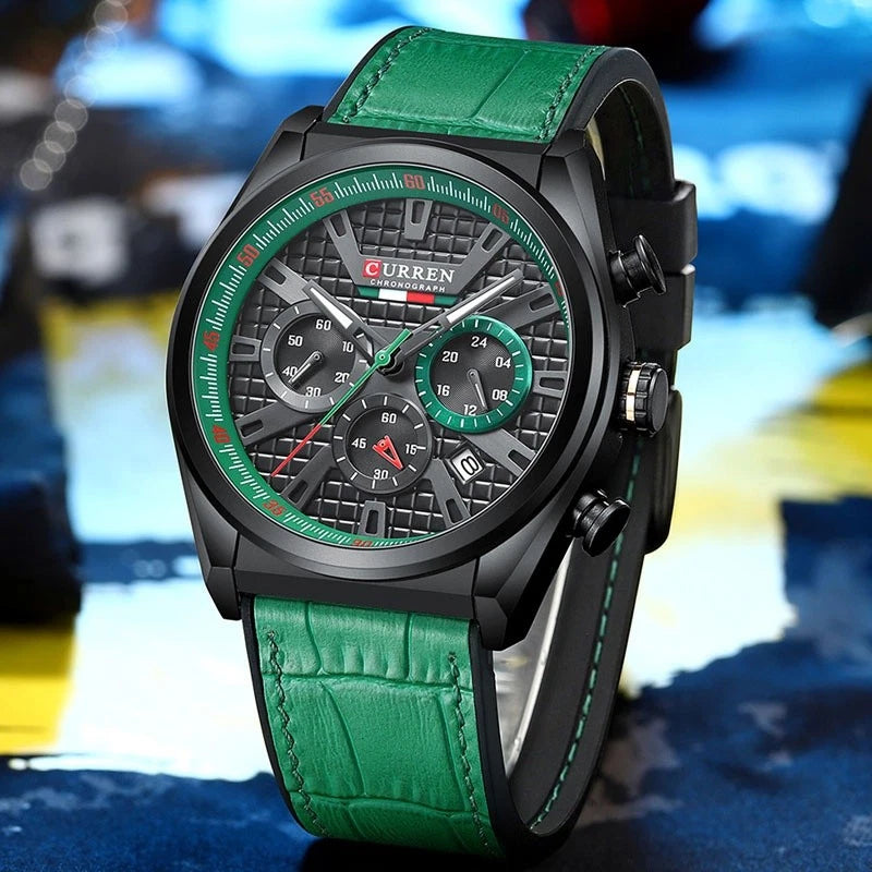 A Curren men's chronograph watch with a black case, textured black dial, and a vibrant green leather strap, shown in a close-up shot against a blurred background.