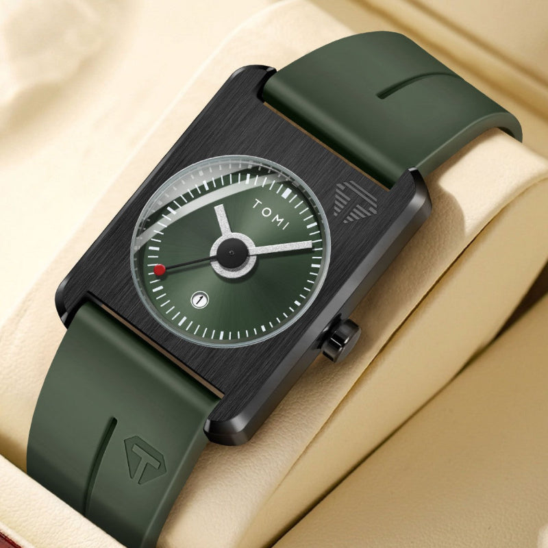 Green watch with black case on a beige background
