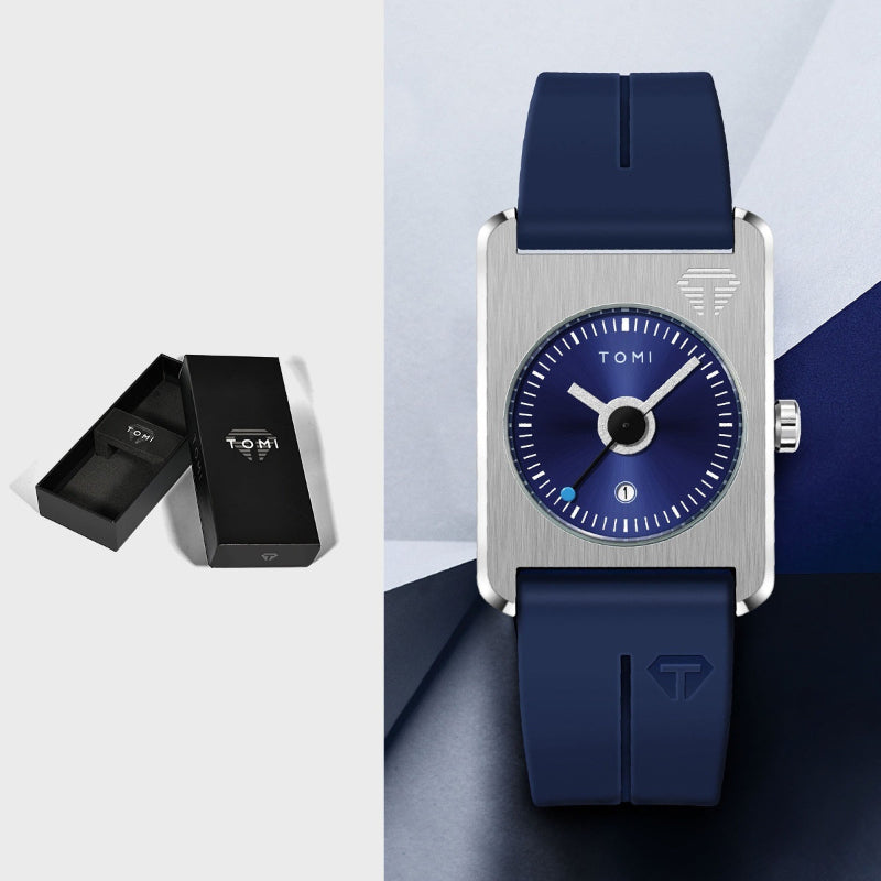 Blue watch with silver case and blue strap on a white background