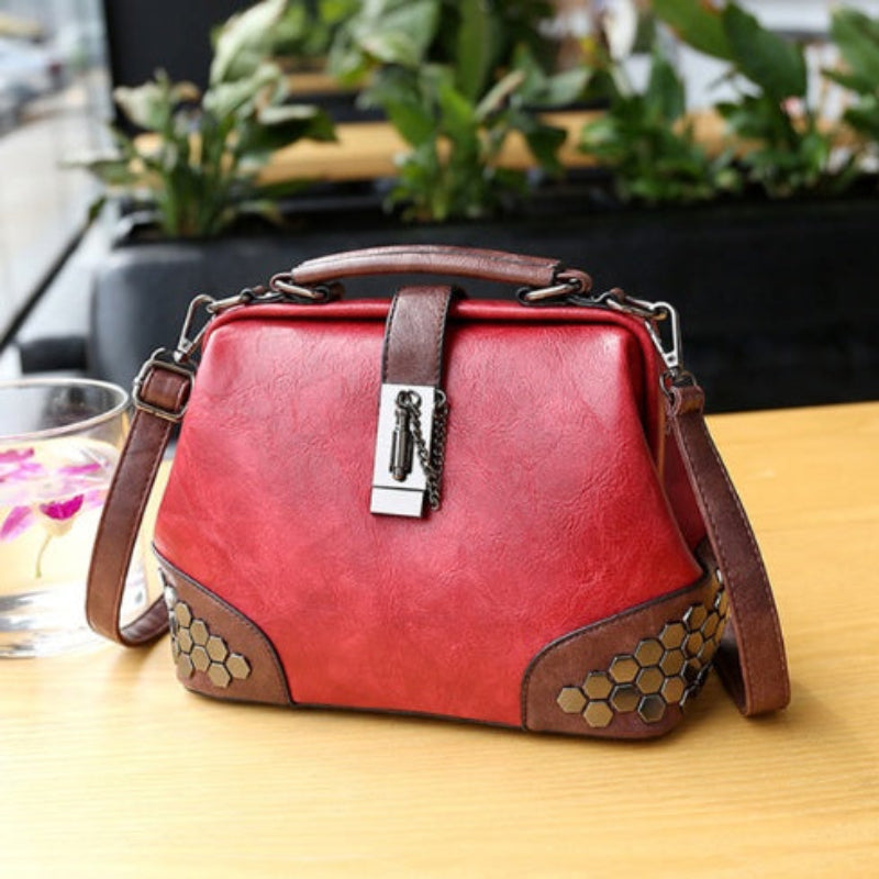 Red handbag with brown accents