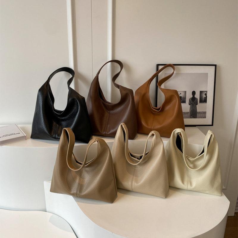 Women's faux leather handbag and wallet set