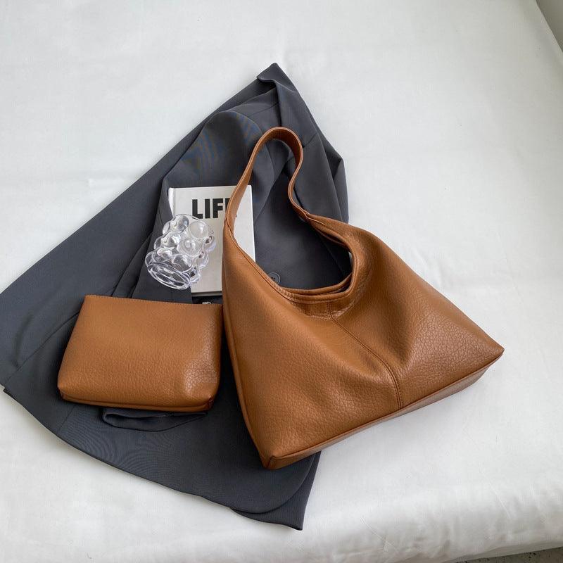Women's faux leather handbag and wallet set